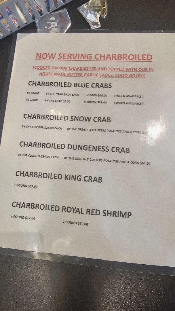 Indoor dining with seafood dishes and drinks.