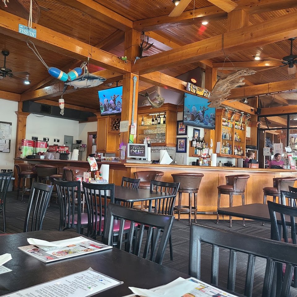 Outdoor tables beside live music seating.